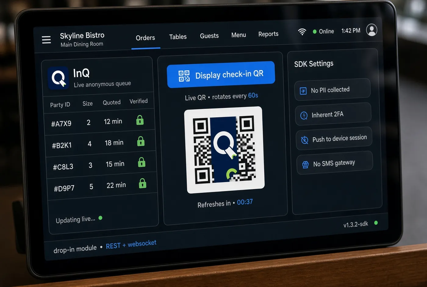 A POS tablet running the InQ SDK: live queue, rotating check-in QR code and SDK settings
